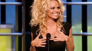 Glad Confused Gals: Pamela Anderson realizing her nipps are visible on television