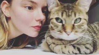 Becoming one with the cat - Anya Taylor-Joy