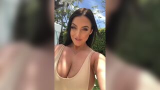 Angela walks for us again. Her top can hardly hold her breasts in. - Angela White