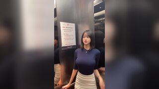 Busty elevator girl - Big Breasts