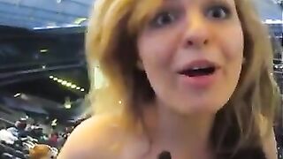 German chick showing off in a stadium - Flashing