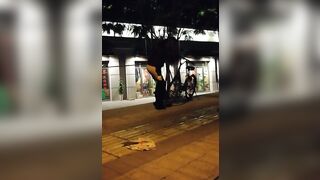 Flashing And Flaunting: strip next to a bike at night
