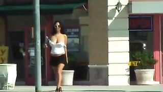 Flashing And Flaunting: Large Breasts walking down the street