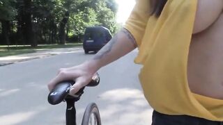 Titty out on her bike - Flashing And Flaunting