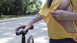Flashing And Flaunting: Titty out on her bike