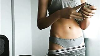Gals With iPhones: texting babe exposes her bellybutton