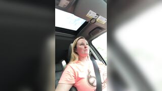 Just a mom doing her thing.... showing titties while driving to the car rider line